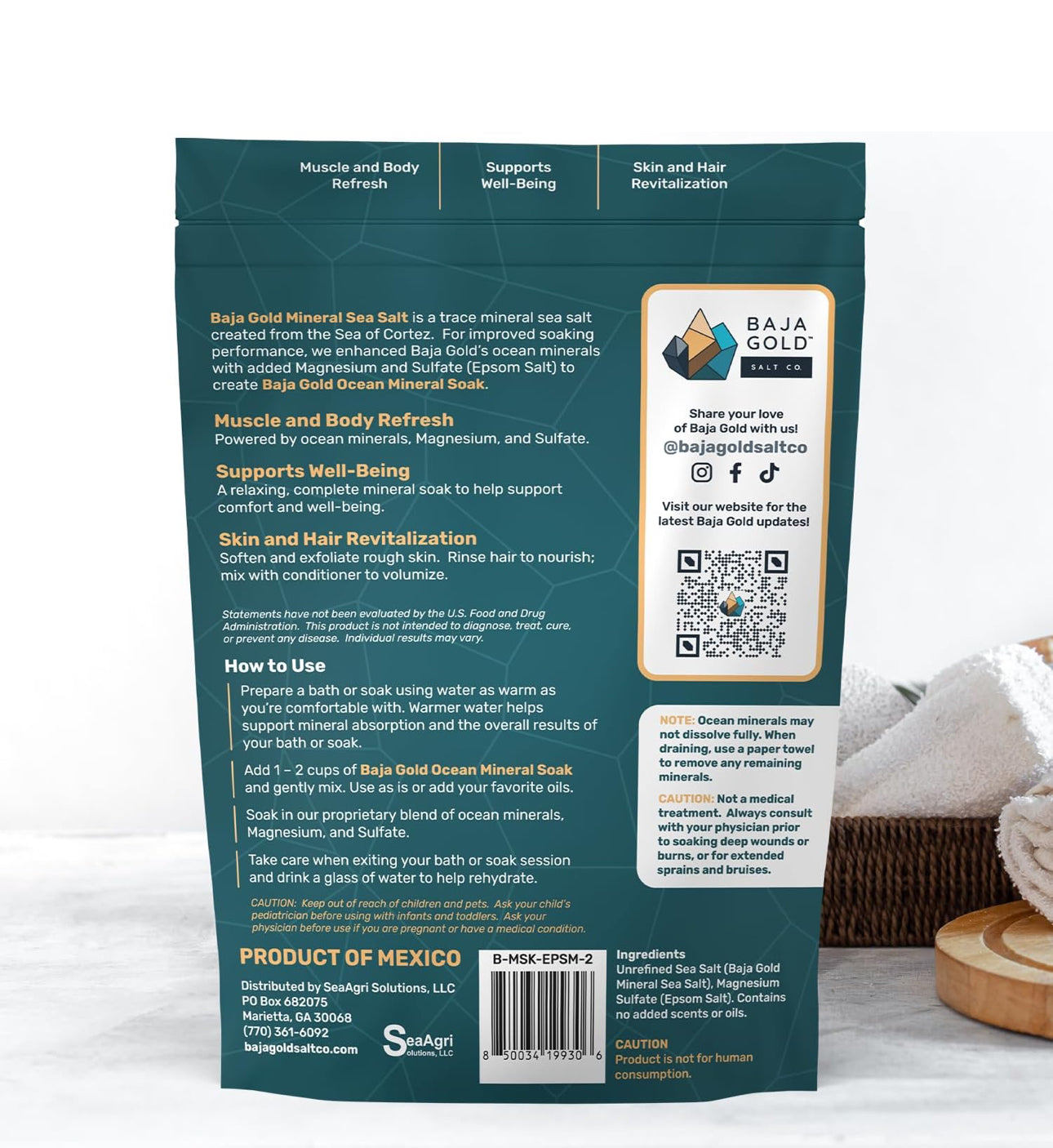 Back of a Baja Gold Mineral Sea Salt packaging with text and QR code on a white background