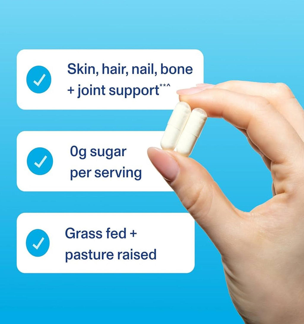 Hand holding two capsules with text on a blue background