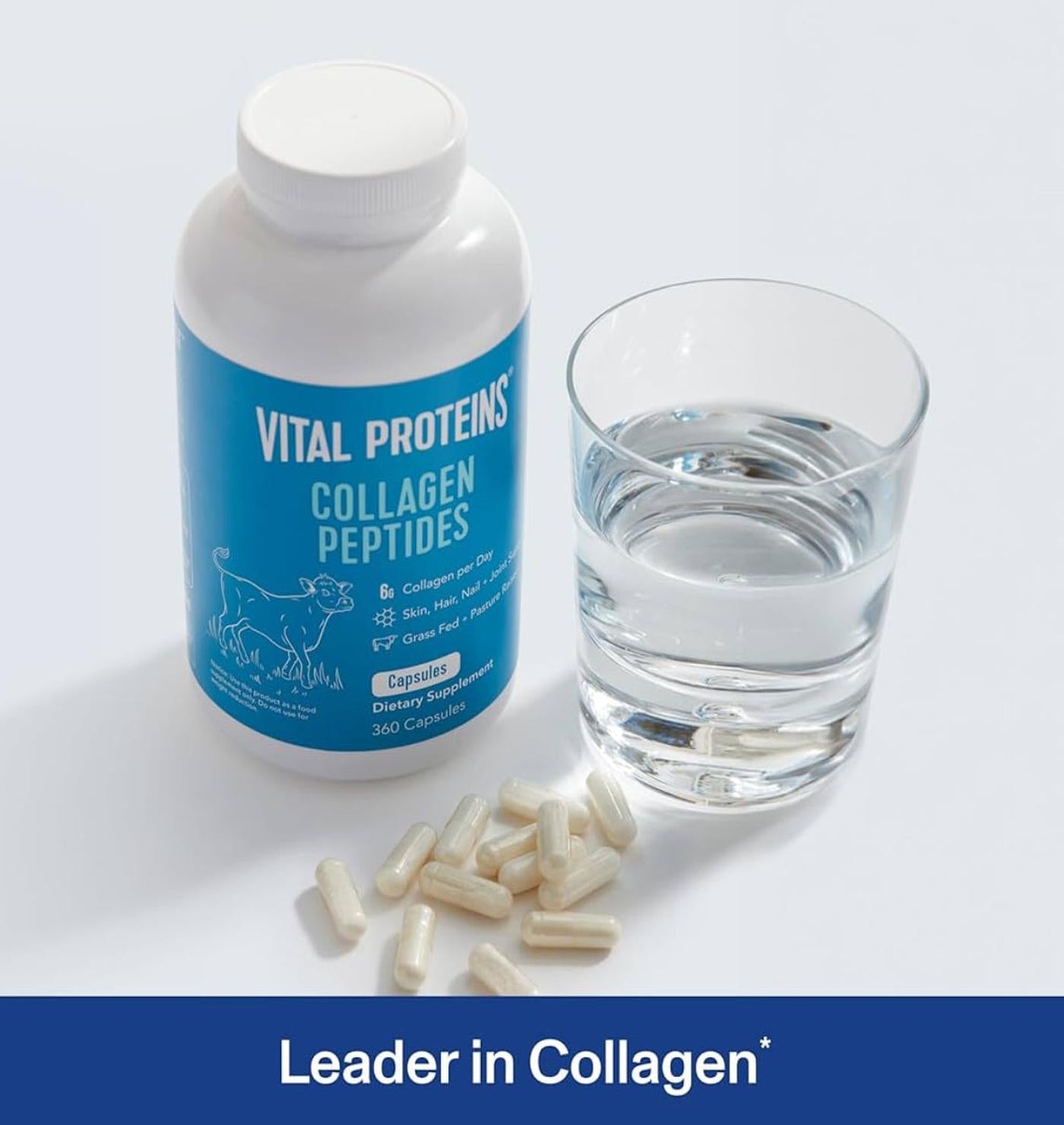 Vital Proteins Collagen Peptides bottle with capsules and a glass of water on a light background