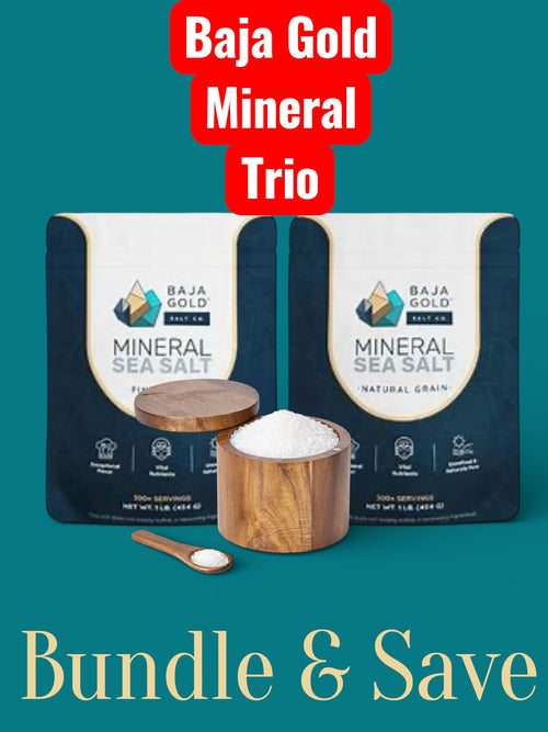 Baja Gold Mineral Sea Salt packaging with wooden containers and spoon on a teal background