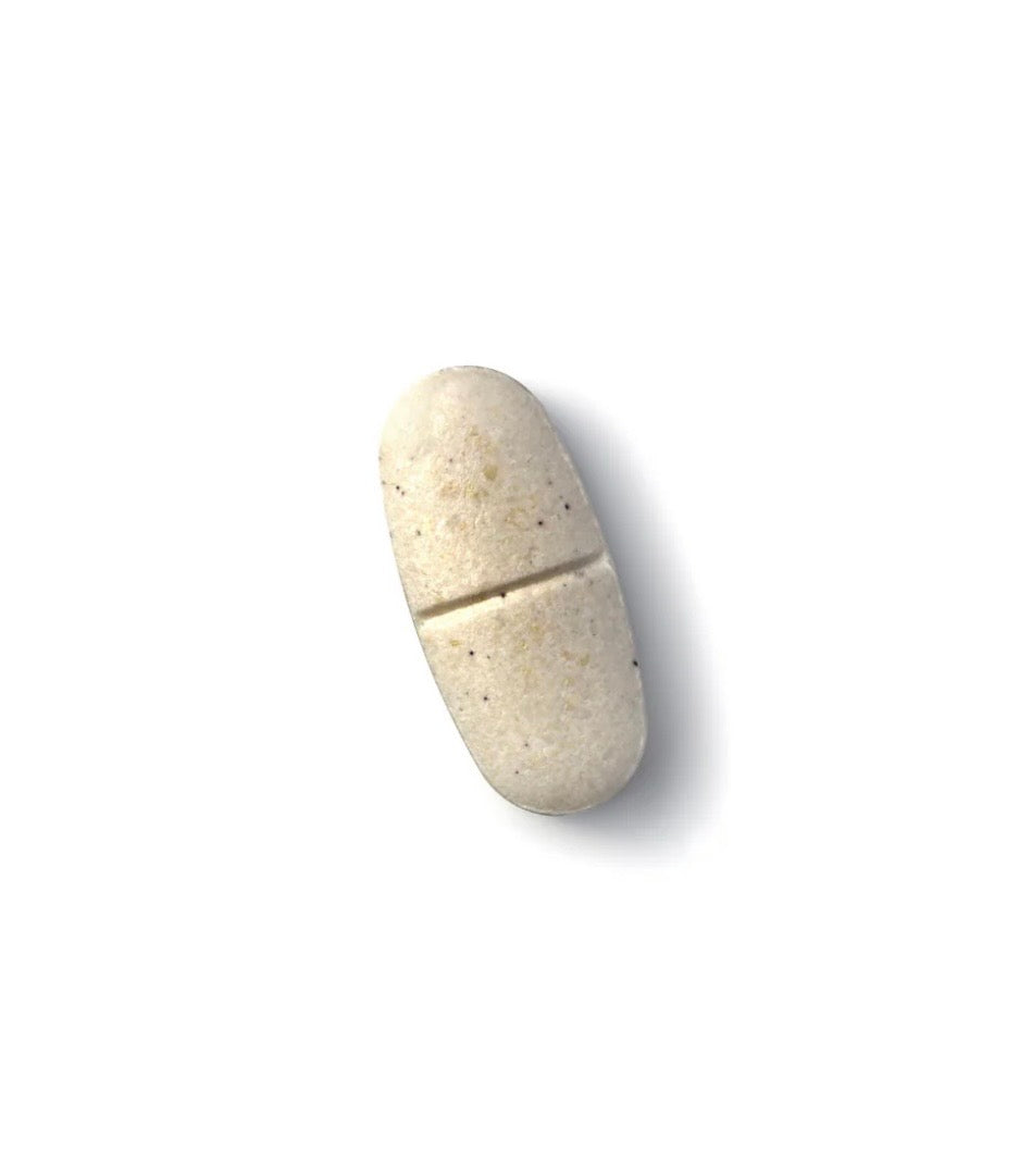 A single off-white, oval-shaped split pill or capsule with a matte, slightly speckled texture, shown on a plain white background with a soft drop shadow.